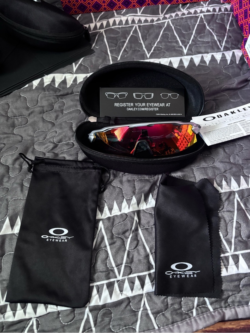 Oakley Men’s Sunglasses with Red-Orange Mirrored Lenses